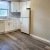 Kitchen with White Appliances at Glen Brook Apartments in Glenolden